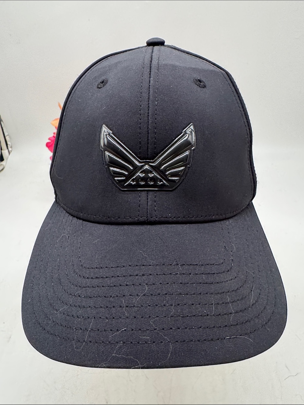 Volition Black Baseball Cap with Glossy Wing Emblem